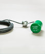 A green, cylindrical object known as "Eco-Float Green," functioning as a mercury-free level switch, is attached to a metal ball with a black cable. This innovative liquid level control system is showcased against a light gray background.